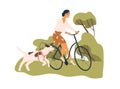 Happy woman riding bicycle with dog tied to bike. Pet owner cycling with doggy running nearby. Cyclist walking with