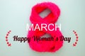 Happy Woman`s Day message with eight number on pink colour scarf