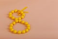 Happy woman`s day, with yellow bead and bow,