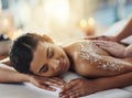 Happy woman, salt scrub and massage back at spa to relax for skincare, exfoliation or self care. Female person, beauty Royalty Free Stock Photo