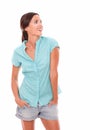 Happy woman in short jeans looking to her left Royalty Free Stock Photo