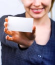 Happy woman showing blank business card Royalty Free Stock Photo