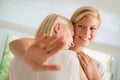 Happy woman showing engagement ring to mother Royalty Free Stock Photo