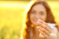 Happy woman showing her engagement ring at sunset Royalty Free Stock Photo