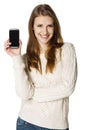 Happy woman showing her mobile phone Royalty Free Stock Photo