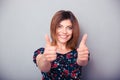 Happy woman showing thumbs up Royalty Free Stock Photo