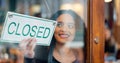 Happy woman, small business or closed sign on window in coffee shop or restaurant for end of service. Closing time Royalty Free Stock Photo