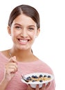 Happy, woman and smile with healthy bowl of breakfast cereal against a white studio background. Portrait of isolated Royalty Free Stock Photo