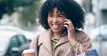 Happy woman, smile and phone for communication on street while walking, coffee cup and shopping bags. African person Royalty Free Stock Photo