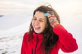 Happy woman on a on snow covered mountain Royalty Free Stock Photo