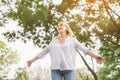 Woman outstretched arms enjoying freedom