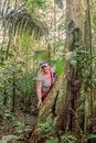 Happy Woman Standing Next To A Kapok Tree