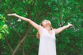 Happy woman standing stretch her arms in the air. Enjoy fresh ai Royalty Free Stock Photo