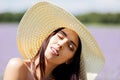 Happy woman in summer field. Young girl relax outdoors. Freedom concept. Royalty Free Stock Photo