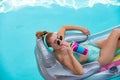 Happy woman summer vacation. Girl in swimmsuit. Summer lady on inflatable mattress. Royalty Free Stock Photo