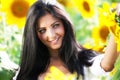 Happy woman in sunflower field Royalty Free Stock Photo