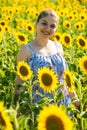 Happy woman in sunflower field Royalty Free Stock Photo