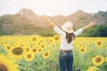 Happy woman in sunflower field smiling with happiness Royalty Free Stock Photo