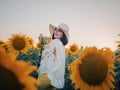 Happy woman in sunflower field. Summer girl Royalty Free Stock Photo