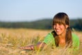 Happy woman in sunset corn field enjoy sun Royalty Free Stock Photo