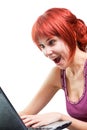 Happy woman surfing internet on laptop Royalty Free Stock Photo