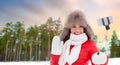 Happy woman taking selfie over winter forest Royalty Free Stock Photo