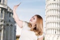 Happy woman taking selfie photo at pizza tower Royalty Free Stock Photo