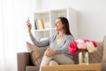 Happy woman taking selfie smartphone at home Royalty Free Stock Photo