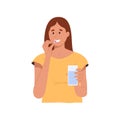 Happy woman taking vitamins, holding pill and glass of water