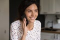 Happy woman talking on mobile phone, getting good news Royalty Free Stock Photo