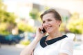 Happy Woman Talking on a Phone Royalty Free Stock Photo