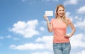 Happy woman or teen girl with blank white paper Royalty Free Stock Photo