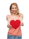 Happy woman or teen girl with red heart shape Royalty Free Stock Photo