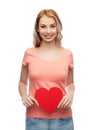 Happy woman or teen girl with red heart shape Royalty Free Stock Photo