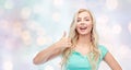 Happy woman or teenage girl showing thumbs up Royalty Free Stock Photo