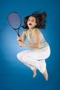 Happy woman with tennis racket Royalty Free Stock Photo