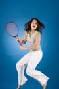 Happy woman with tennis racket