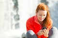 Happy Woman Texting on Phone Royalty Free Stock Photo