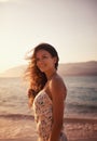 Happy woman, thinking at beach and travel for ocean, view and vacation in Cancun with nature, sunset and breeze. Fresh Royalty Free Stock Photo