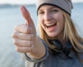 Happy woman with thumb up