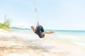 Happy woman on tire swing Royalty Free Stock Photo