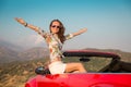 Happy woman travel by car in the mountains Royalty Free Stock Photo