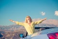 Happy woman travel by car in the mountains Royalty Free Stock Photo