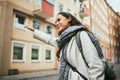 Happy woman, travel and hailing taxi in city, street and road in transportation, traveling and urban commute. Smile Royalty Free Stock Photo