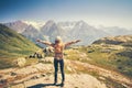 Happy Woman Traveler hands raised hiking Royalty Free Stock Photo