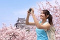 Happy woman traveler take a photo Royalty Free Stock Photo