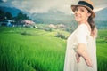 Happy woman traveling in jatiluwih rice terrace, Bali, Indonesia. Royalty Free Stock Photo