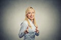 Happy woman with two thumbs up guns hand gesture pointing at you Royalty Free Stock Photo