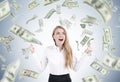 Happy woman under a dollar rain Royalty Free Stock Photo