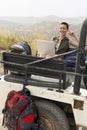 Happy Woman Using Laptop In Car Royalty Free Stock Photo